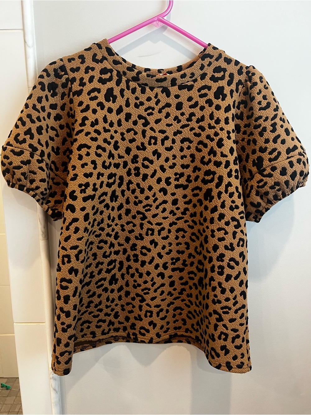 Women’s cheetah print dress top with puff sleeves